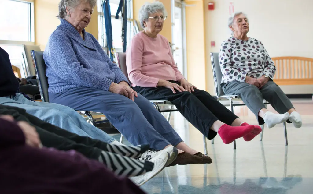 reduce pain with gentle poses in chair yoga for seniors